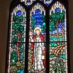 Photograph of a stained glass window, taken from the inside