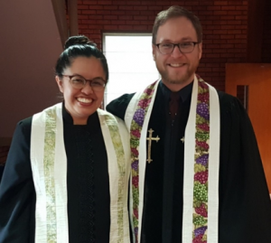 Photograph of Reverends Kelsey Hawisher-Faul and Peter Hawisher-Faul, Co-Pastors